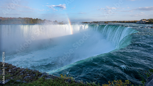 Niagara Falls with rainbow horseshoe waterfalls Ontario, Canada river majestic.   © legedo