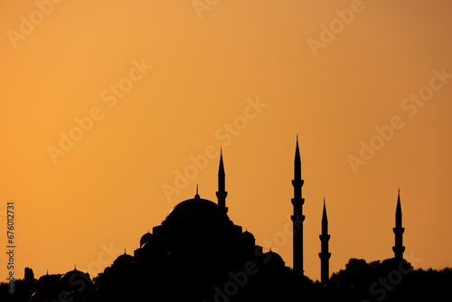 Silhouette of Suleymaniye Mosque at sunset. Ramadan or islamic concept photo