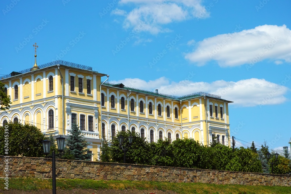 An old historical building on the Tambov embankment  in summer day