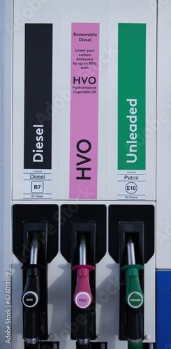 vehicle fuel pumps showing new hydro treated vegetable oil HVO bio diesel fuel
