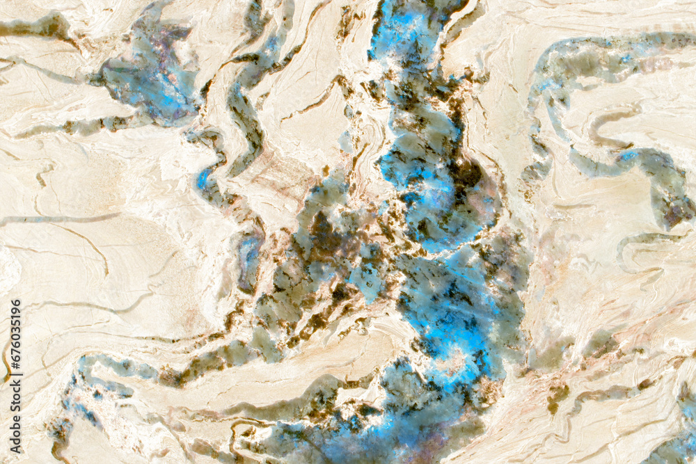Cream marble texture with bright blue cracks and veins, natural stone pattern