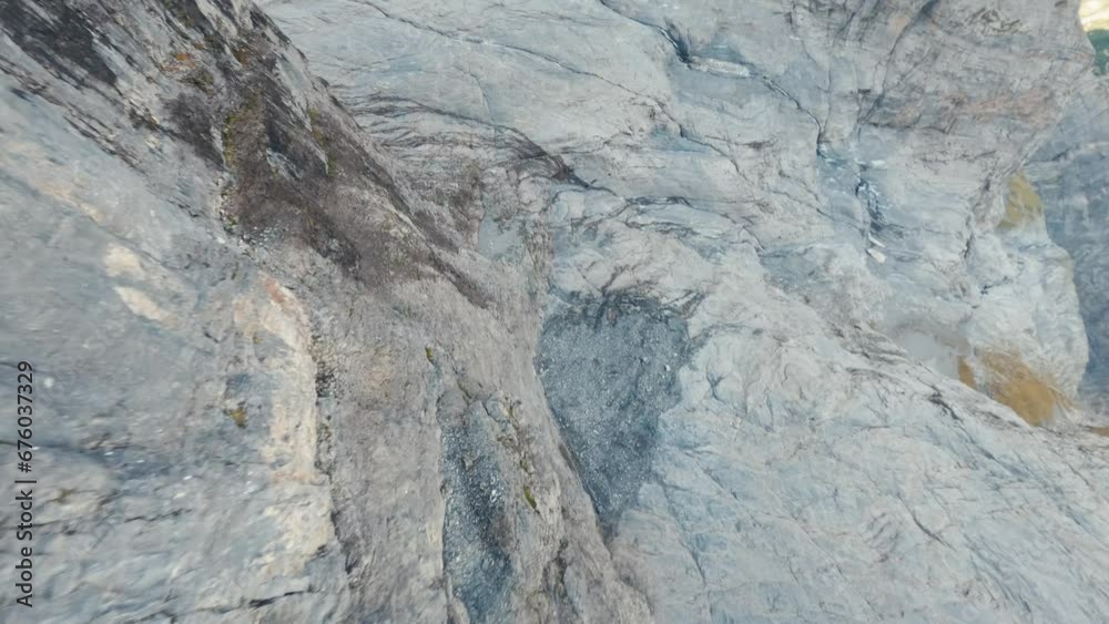 Cinematic FPV of Switzerland alps in Grindelwald, fast pace flying like a bird amazing view of mountain peaks in distance. Cinematic FPV of Switzerland alps in Grindelwald, fast pace flying like a bird amazing view of mountain peaks in distance.