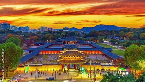 Zoom in,Time lapse 4k-Sunset at the palace Changgyeonggung Autumn in Seoul,South Korea photo
