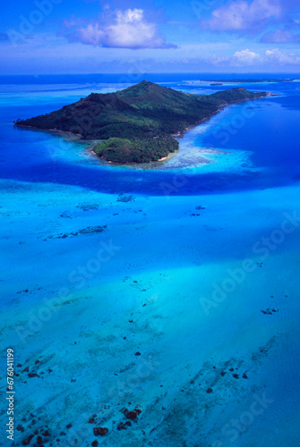 French Polynesia: Helicopter flight near Moorea Island over the coral lagoons