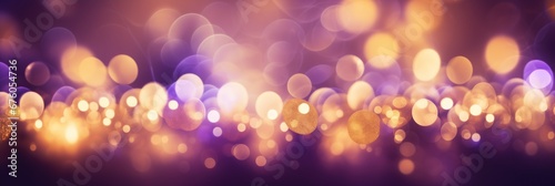 Abstract bokeh lights with golden and purple tones