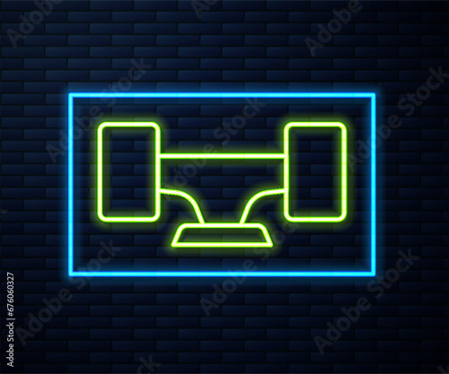 Glowing neon line Skateboard wheel icon isolated on brick wall background. Skateboard suspension. Skate wheel. Vector