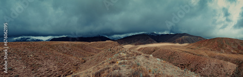 Overcast mountain panorama in Kyrgyzstan in autumn