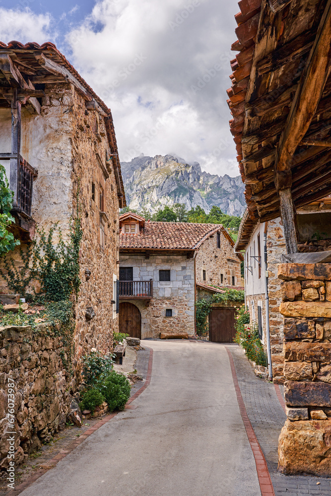 Medieval village of Mogrovejo with the European Peaks in the background.In Camaleño, Cantabria, Spain