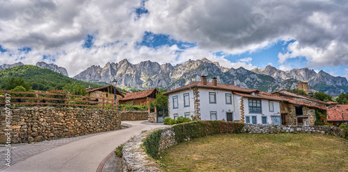 Fototapeta Naklejka Na Ścianę i Meble -  Mogrovejo is a small village located in the municipality of Camaleño. declared an Asset of Cultural Interest and Historical Site.European Peaks in the background.In Calameño, Cantabria, Spain.