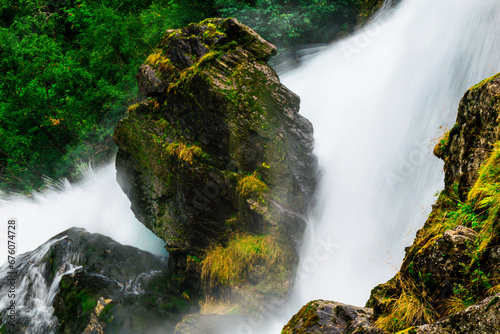 Giant rock showering in the waterfalls. 