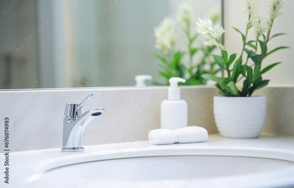 marble sink, toothbrush, soap, tap on light bathroom background marble sink, toothbrush, soap, tap on light bathroom background