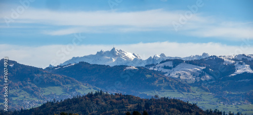 Distant view of the iconic Säntis Peak in the swiss alps from shores of the upper Zurich Lake (Obersee), Rapperswil, St. Gallen, Switzerland © Luis
