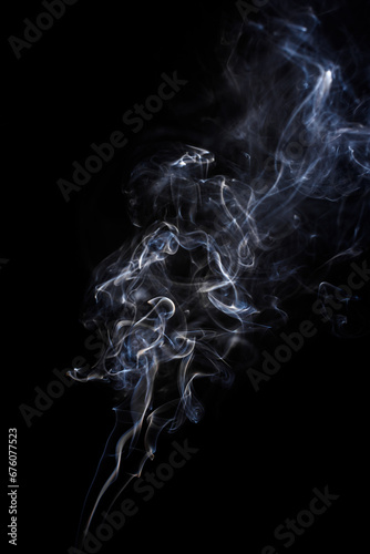 Abstract smoke on black background. Freeze motion vape clouds 