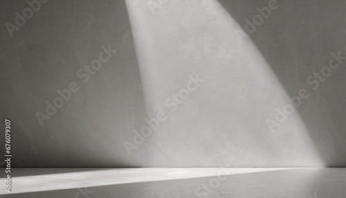 minimal abstract background for product presentation llight on gray plaster wall photo