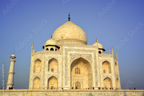 View of the Taj Mahal at sunrise is an ivory-white marble mausoleum on the right bank of the river Yamuna in Agra 