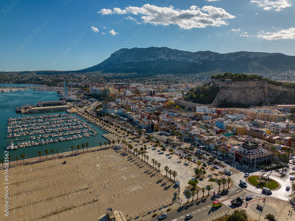 Aerial drone photo of the town and castle ruins of Denia in Spain