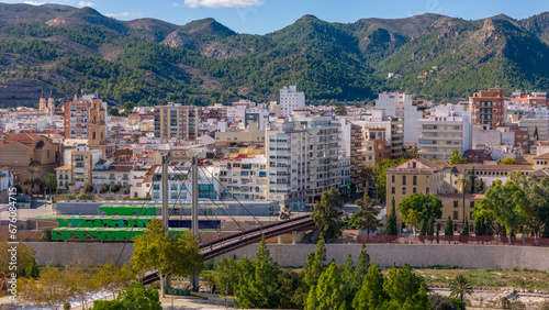 Aerial drone photo of the city centre with mountains in the background of Gandia in the Costa Blanca Spain