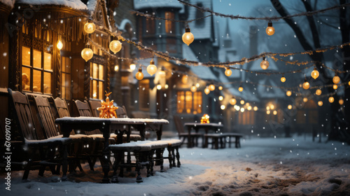 Atmospheric winter evening in the old town during the holiday season. Snow-covered table and chairs on the street, with burning garlands. Winter New Year atmosphere, banner, card