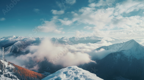Lanscape shot, panoramic view of snowy alpine mountain. Snow and forest, cloudy sky and morning sun © NK Project
