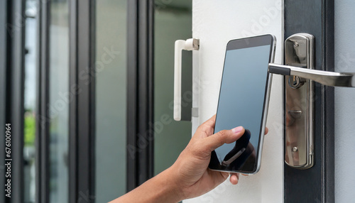 mobile smart phone use for open safety door and opens the door of his home.