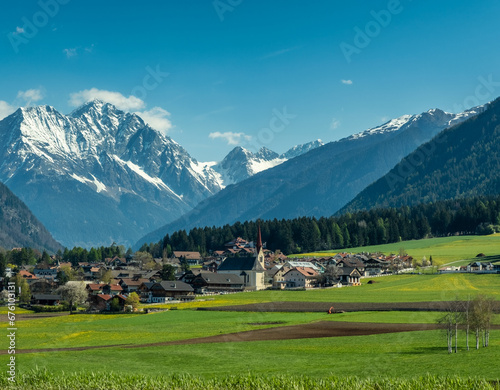 Town and valley in Austria and Alps mountains