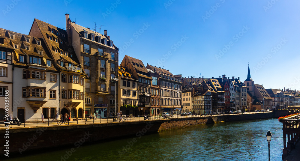 Scenic summer cityscape of old town of Strasbourg with half-timbered houses on canals, Alsace, France