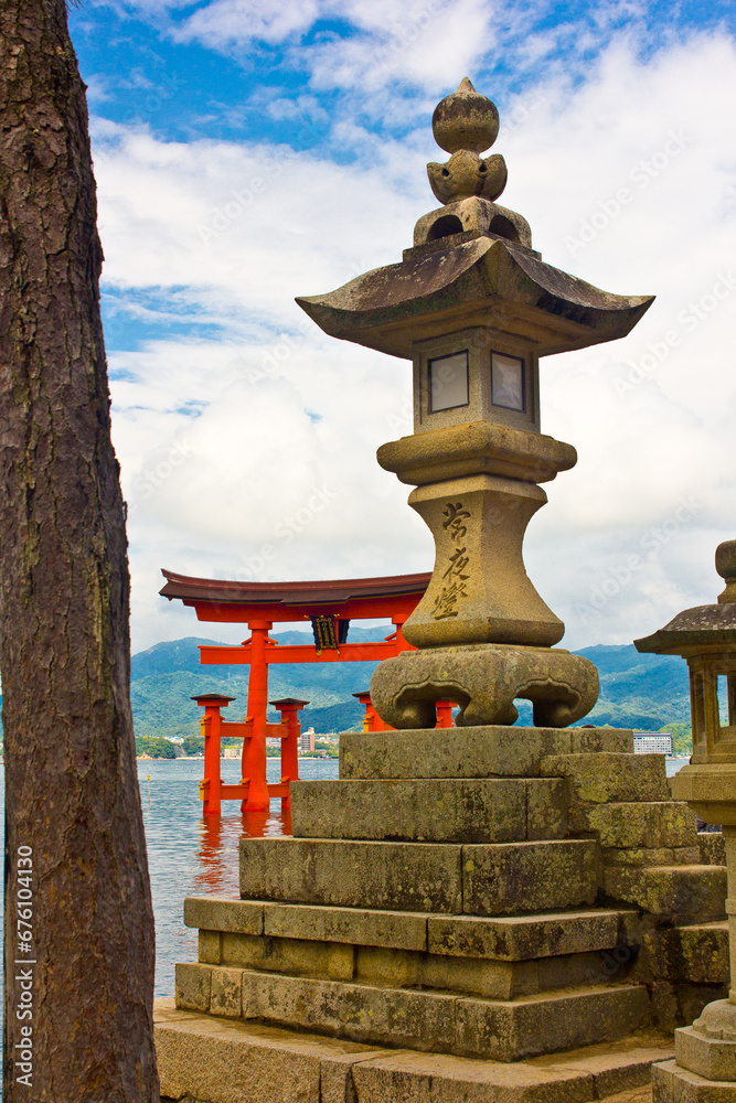 ancient torii in the island of miyajima in japan
ancient torii in the island of miyajima in japan