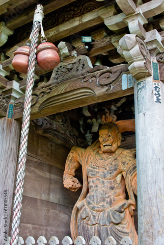 staute in a temple in myiajima in japan photo