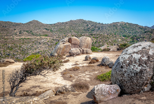 The granite rocks of Volax, a traditional village in the middle of Tinos, Cyclades, Greece. According to a strange phenomenon the village is surrounded by huge, smooth, granite stones. photo