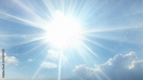 Bright sunbeams in the sky background. Minimal nature  summer  seasonal concept. Abstract product placement idea. Copy space.