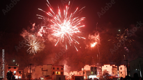 The beautiful fireworks show for celebrating the Chinese  traditional spring festival in the countryside village photo