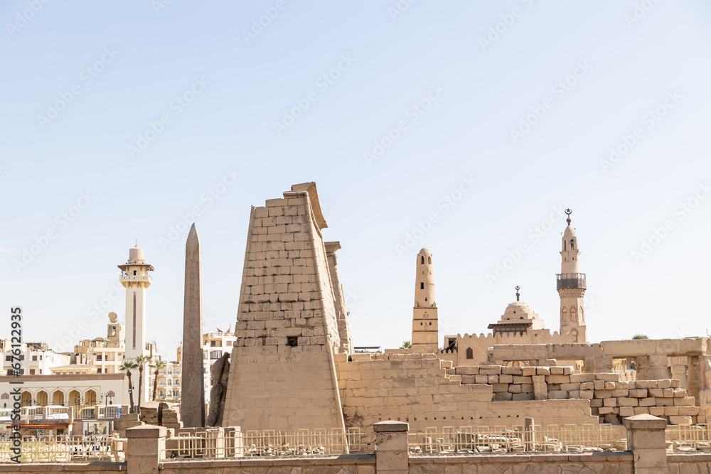 ancient egyptian obelisks and mosques in ruins in Luxor, Temple