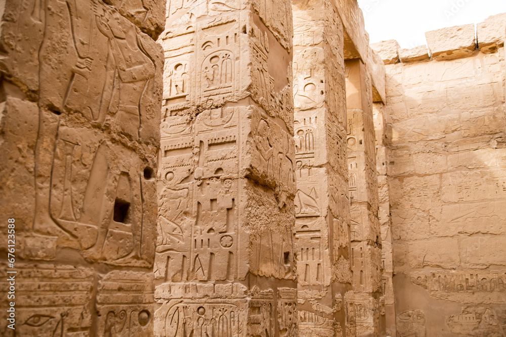 massive ancient hieroglyphs on columns of Karnak Temple in Luxor Egypt massive ancient hieroglyphs on columns of Karnak Temple in Luxor Egypt