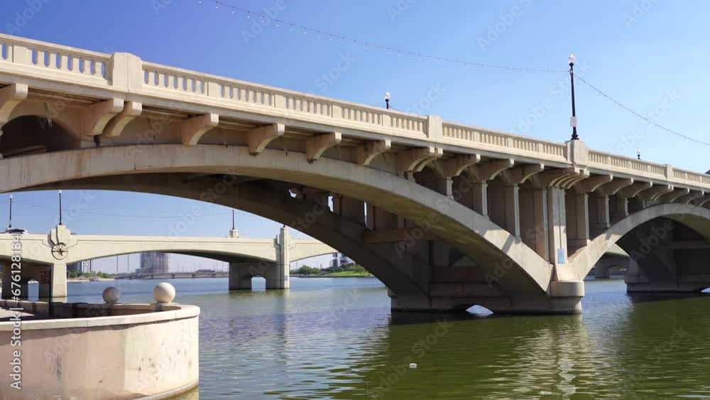 Tempe Town Lake Bridges in Tempe Arizona, America, USA. A beautiful spot to see the Temps skyline and two bridges crossing the town lake. Tempe Town Lake Bridges in Tempe Arizona, America, USA. A beautiful spot to see the Temps skyline and two bridges crossing the town lake.