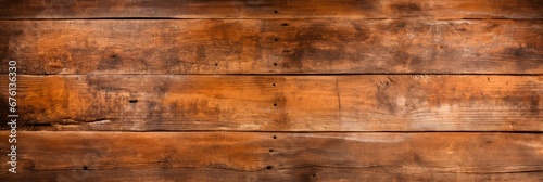 Vintage brown rustic wooden texture with soft illumination and warm glow bright wood background