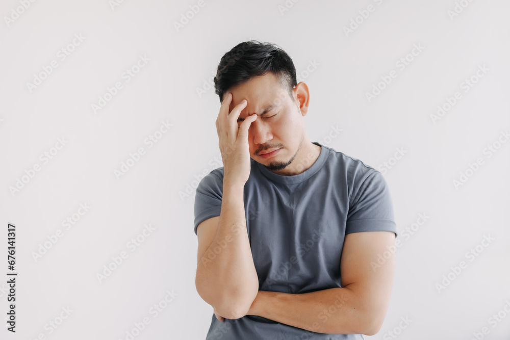 Unpleasant feeling emotion of asian man isolated on white. Depressed and Stress. Unpleasant feeling emotion of asian man isolated on white. Depressed and Stress.