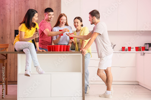 Group of young friends play...