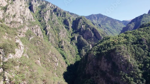 Beautiful mountains in Caranca Gorges hiking trail in French Pyrenees during summer showcasing steep cliffs and beautiful landscapes. photo