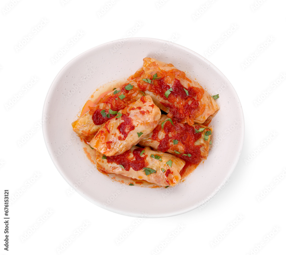 Plate of delicious stuffed cabbage rolls cooked with homemade tomato sauce isolated on white, top view Plate of delicious stuffed cabbage rolls cooked with homemade tomato sauce isolated on white, top view