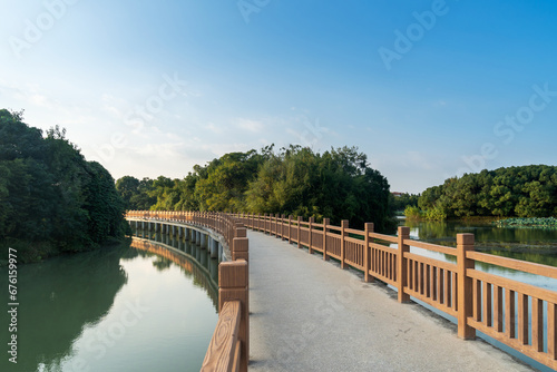 stone footbridge in an Asian garden photo