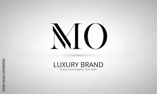 MO M mo initial logo | initial based abstract modern minimal creative logo, vector template image. luxury logotype logo, real estate homie logo. typography logo. initials logo photo