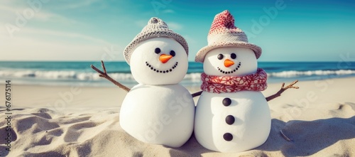 Snowman on vacation at the beach in winter