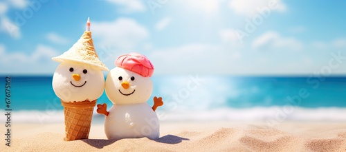 Snowman and icecream cone at the beach