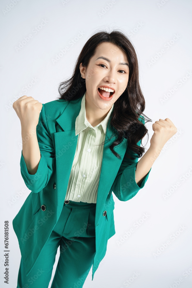 © Timeimage - Image of young Asian business woman on background © Timeimage - Image of young Asian business woman on background