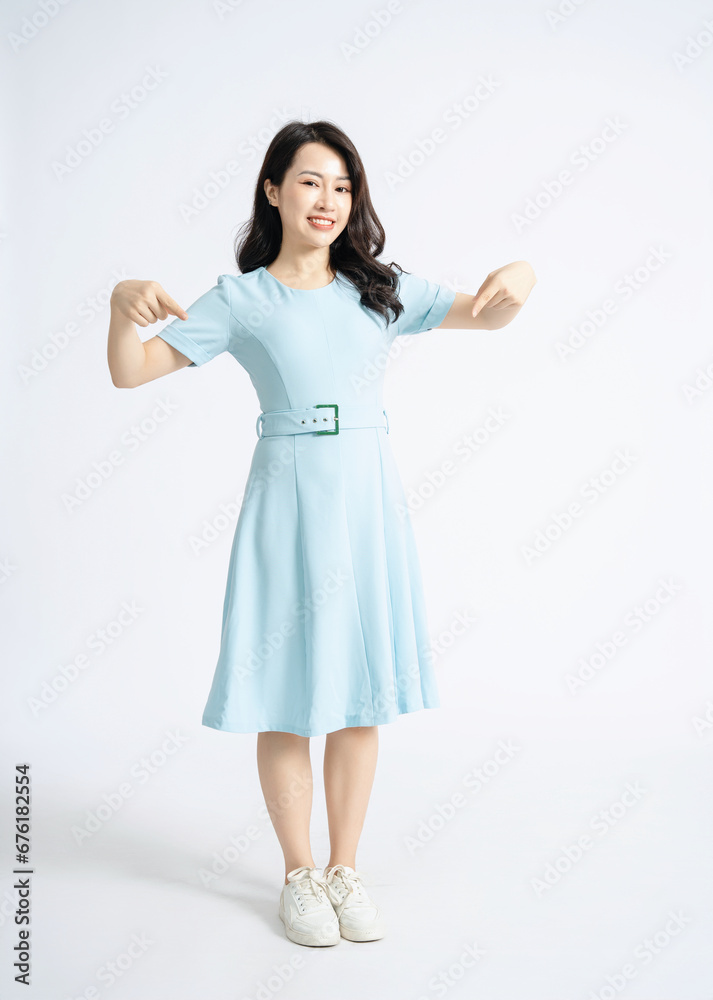 Photo of young Asian woman on background Photo of young Asian woman on background