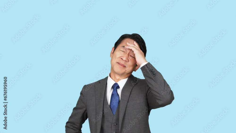 失敗して落ち込む中年ビジネスマン