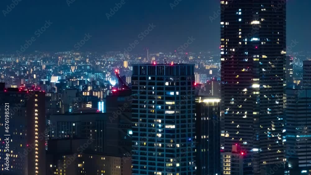 A night timelapse of building lights in Osaka telephoto shot A night timelapse of building lights in Osaka telephoto shot