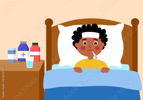Cute sick boy with thermometer in mouth lay in bed. Flu child with fever.