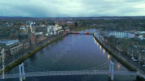 Flying South over the Greig Street bridge travelling up river Ness through the city photo