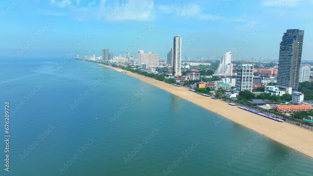 Aerial vistas of Jomtien Beach in Pattaya showcase a pristine coastline, perfect for sun-seekers and water enthusiasts. Top tourist spots: explore popular sites. Thailand. Travel concept. 4K HDR.
Aerial vistas of Jomtien Beach in Pattaya showcase a pristine coastline, perfect for sun-seekers and water enthusiasts. Top tourist spots: explore popular sites. Thailand. Travel concept. 4K HDR.